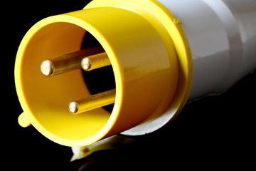 Industrial electric plug.
An industrial electric plug on black background.