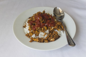 rice soy granules and ketchup white background