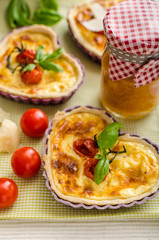 Quiche with cheese and cherry tomatoes