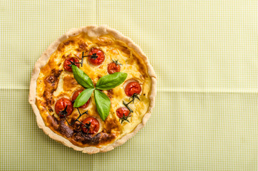 Quiche with cheese and cherry tomatoes