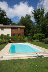 Private swimming pool at summertime