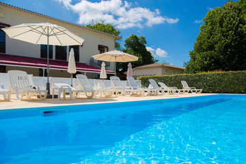 Private swimming pool at summertime