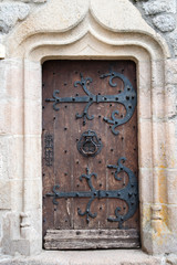 Ancient doors with forged details
