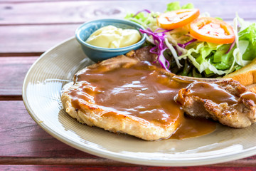 pork steak and vegetable salad