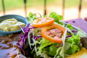 pork steak and vegetable salad
