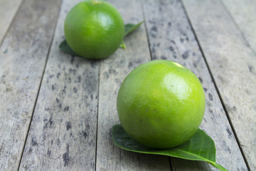 lime slice on wood plank