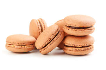 Tasty coffee macarons isolated on white