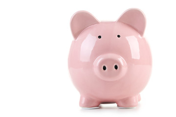 Pink piggy bank isolated on a white
