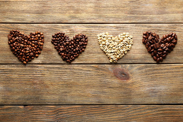 Coffee beans on wooden background