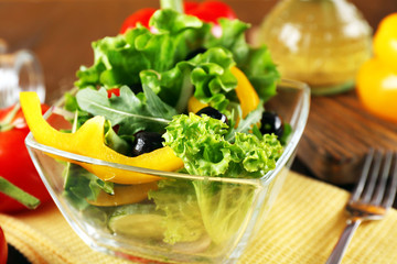 fresh vegetable salad in bowl on table close up