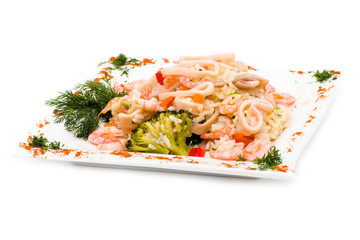 Dish with squid, shrimp, rice and vegetables