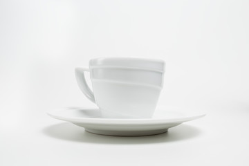 White empty coffee cup on white background