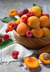 Fresh ripe apricots and raspberry