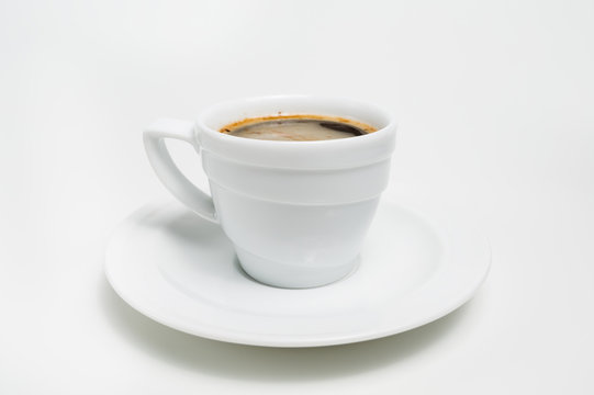 White coffee cup with coffee  on white background