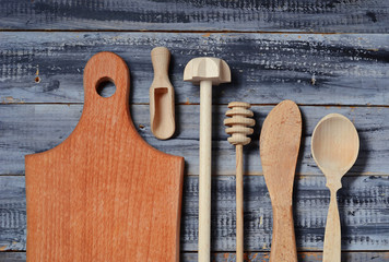 Kitchen wooden utensils  board, knife, spoon, dipper
