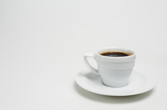 White coffee cup with coffee  on white background