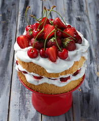 Summer cake with strawberry and cherry