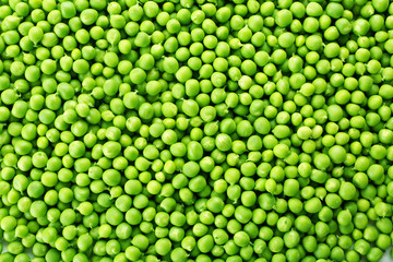 Heap of fresh green peas close up