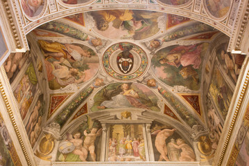 Fototapeta na wymiar Rome - The frescoes The Four Evangelists on the ceiling