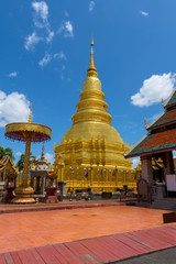 Fototapeta premium Wat Phra That Hariphunchai with blue sky in Lamphun Province, Th