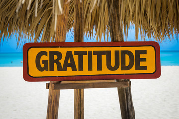 Gratitude sign with beach background
