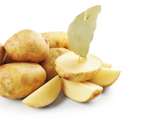 Naklejka na ściany i meble young potatoes with bay leaf isolated on white
