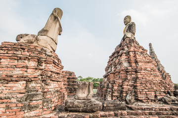 Ancient buddha statue and ancient pagoda at Chaiwathanaram Templ