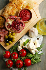 Ingredients of Mediterranean cuisine, on wooden board background