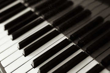 keys of the old grand piano in black and white