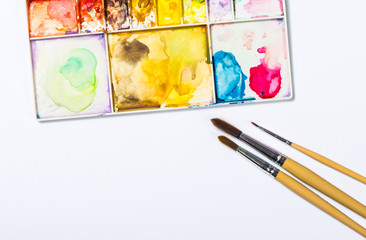art palette with brushes and paints