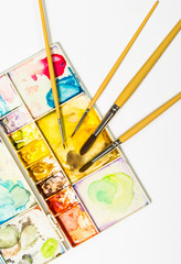 art palette with brushes and paints