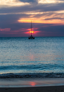 Fototapeta Sunset with yatch