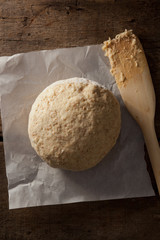  fresh dough on wooden background