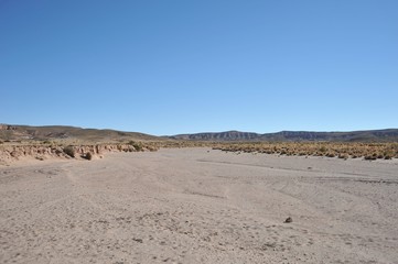 	

 The bed of a dry mountain river in the Altiplano
