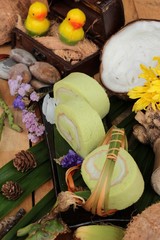 Green cake rolls filled with coconut.