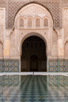 Reflections in the courtyard pool, Medersa Ali Ben Youssef (Madrasa Bin Yousuf), Medina, UNESCO World Heritage Site, Marrakech, Morocco, North Africa, Africa