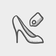 Shoe with tag sketch icon