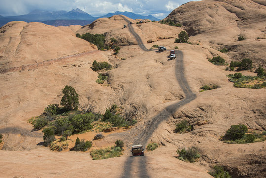 Hummer driving on the Slickrock trail, Moab, Utah