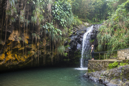 Woman looking at the Annandale Falls, Grenada, Windward Islands