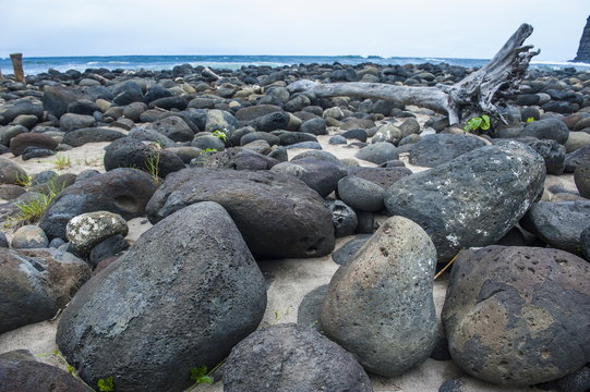 Huge pebbles on Halawa Beach in Halawa Bay on the island of Molokai, Hawaii