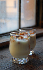 close up of lemon pudding with biscuits and lavender