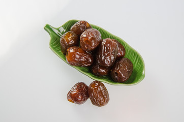 Dried preserved. Sweet syrup monkey apple or Chinese date on bac