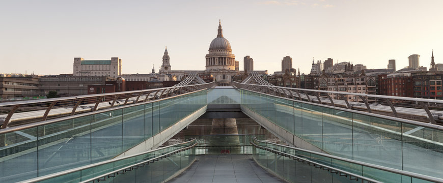 Millennium Bridge and St. Paul's Cathedral at sunrise, London