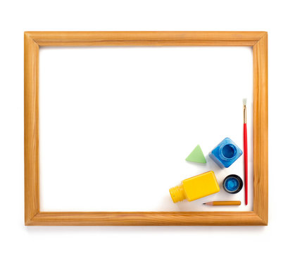 paint supplies and frame isolated on white