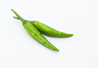 green chili on white background