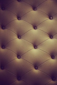 Brown Couch Background Texture With Sunken Buttons.