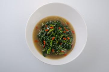 Vegetable soup on isolated white