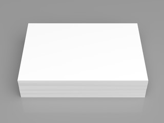 Pile of white paper on grey background