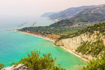 Obraz premium Gargano coast: Mattinatella or Fontana delle Rose beach.MATTINATA (Apulia) - ITALY-The Mattinatella beach holds two adjoining beaches,separated by a 100m wide rock.