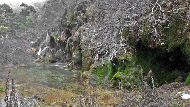 Natural   waterfall at river  in winter. Cuenca, Spain